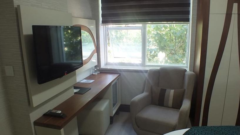 Imagen de la habitación del Hotel Lotis. Foto 10