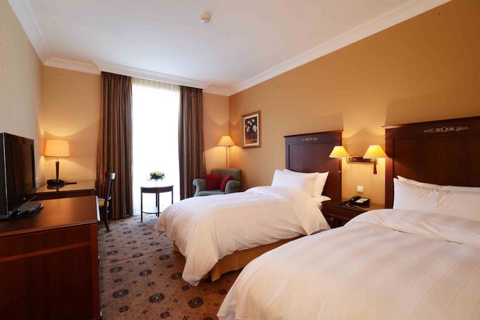 Imagen de la habitación del Hotel Lotte City Tashkent Palace. Foto 11