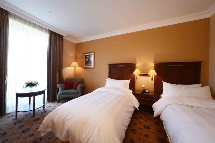 Imagen de la habitación del Hotel Lotte City Tashkent Palace. Foto 12