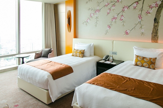 Imagen de la habitación del Hotel Lotte Hanoi. Foto 11