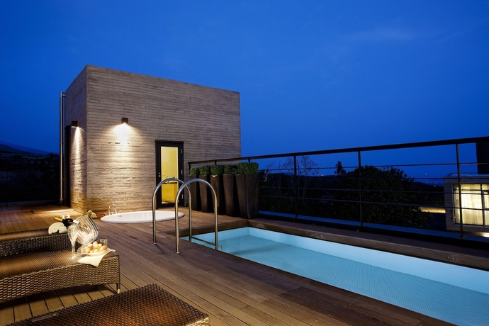 Imagen de la piscina del Hotel Lotte Resort Jeju Artvillas. Foto 19