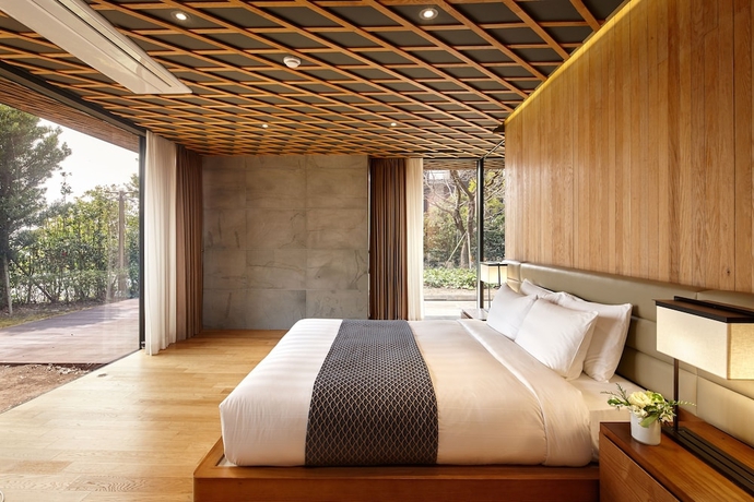 Imagen de la habitación del Hotel Lotte Resort Jeju Artvillas. Foto 12