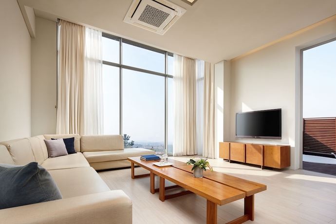 Imagen de la habitación del Hotel Lotte Resort Jeju Artvillas. Foto 14
