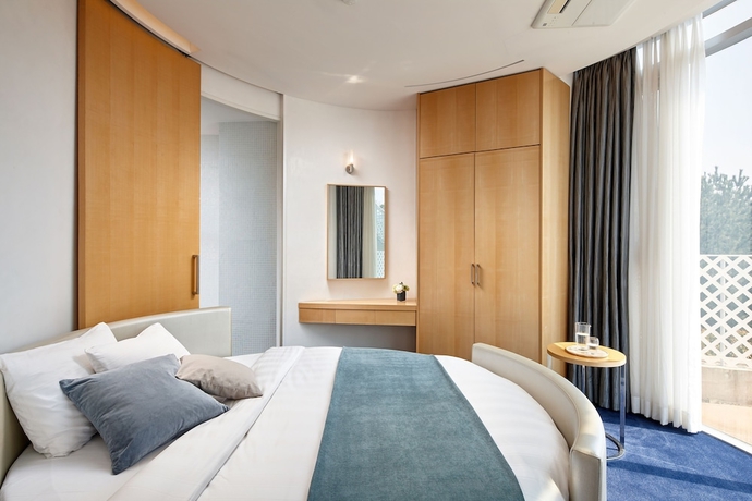 Imagen de la habitación del Hotel Lotte Resort Jeju Artvillas. Foto 17