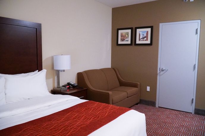 Imagen de la habitación del Hotel Lotus BLU Inn and Suites. Foto 10