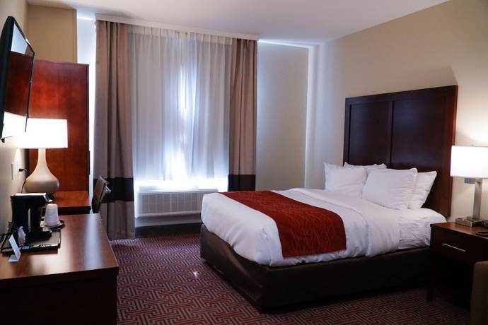 Imagen de la habitación del Hotel Lotus BLU Inn and Suites. Foto 16