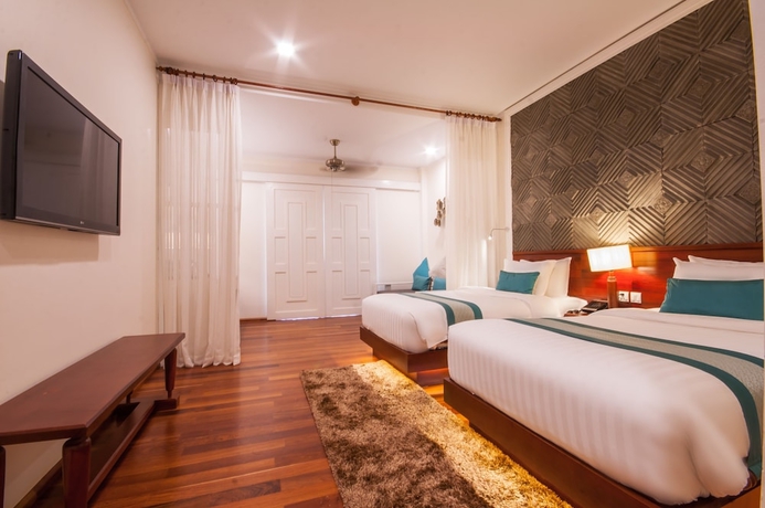 Imagen de la habitación del Hotel Lotus Blanc Resort. Foto 7