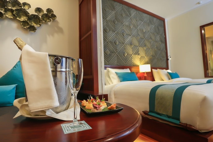 Imagen de la habitación del Hotel Lotus Blanc Resort. Foto 11