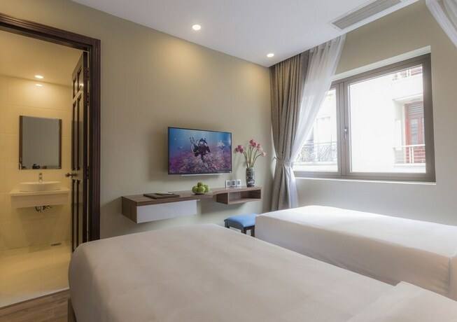 Imagen de la habitación del Hotel Lotus Boutique. Foto 2