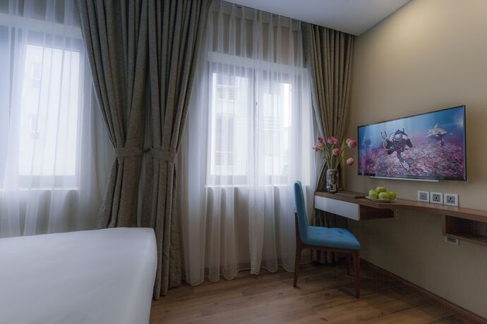 Imagen de la habitación del Hotel Lotus Boutique. Foto 9