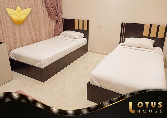 Imagen de la habitación del Hotel Lotus Building. Foto 4