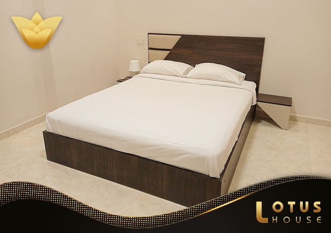 Imagen de la habitación del Hotel Lotus Building. Foto 5