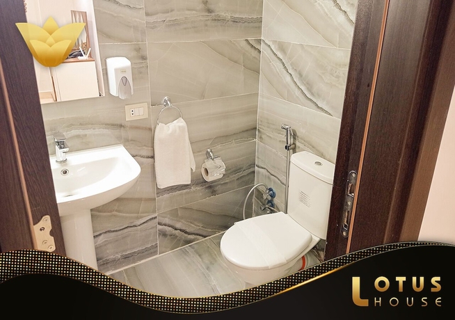 Imagen de la habitación del Hotel Lotus Building. Foto 8