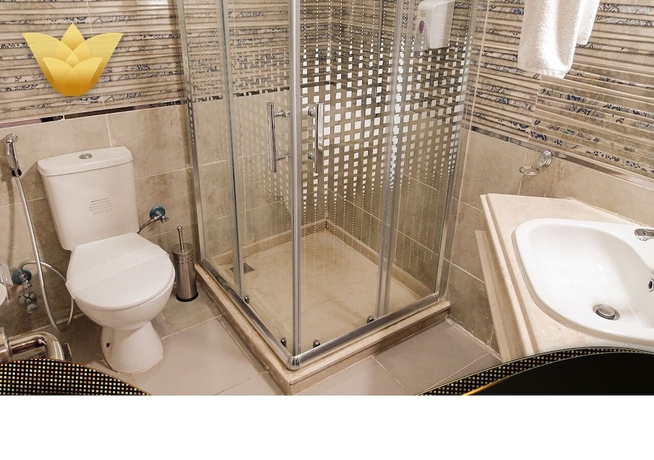 Imagen de la habitación del Hotel Lotus Building. Foto 10