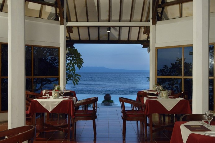 Imagen del bar/restaurante del Hotel Lotus Bungalows. Foto 2