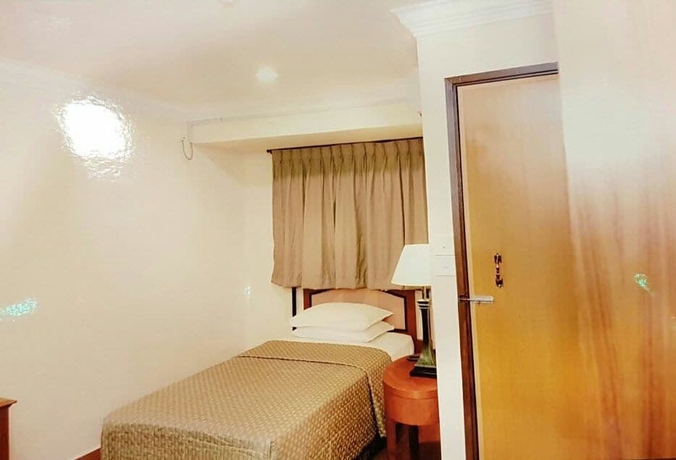 Imagen de la habitación del Hotel Lotus Family Hotel. Foto 11