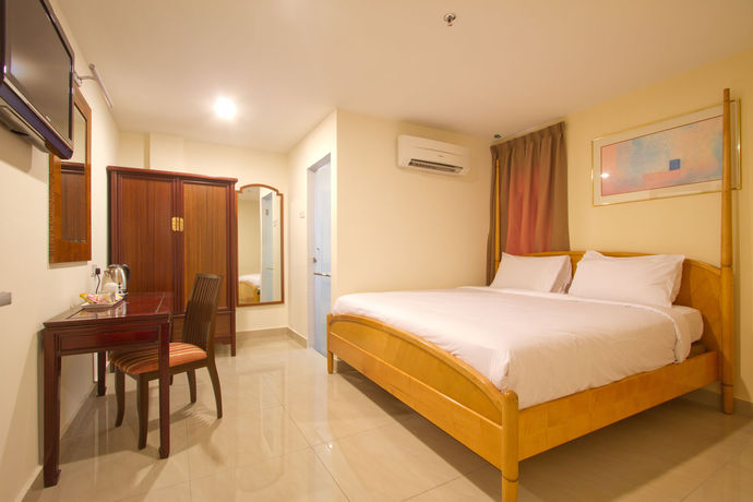 Imagen de los interiores del Hotel Lotus Family , Masjid India. Foto 12