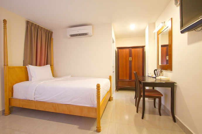 Imagen de la habitación del Hotel Lotus Family , Masjid India. Foto 8