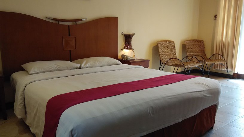 Imagen de la habitación del Hotel Lotus Garden. Foto 6