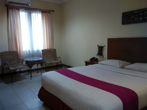 Imagen de la habitación del Hotel Lotus Garden. Foto 8