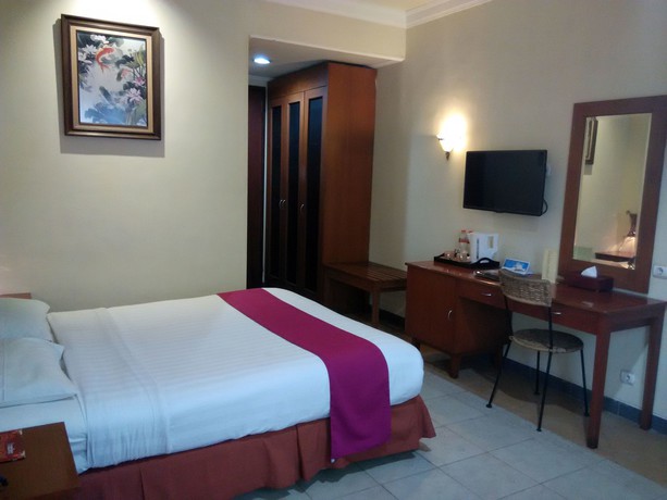 Imagen de la habitación del Hotel Lotus Garden. Foto 12