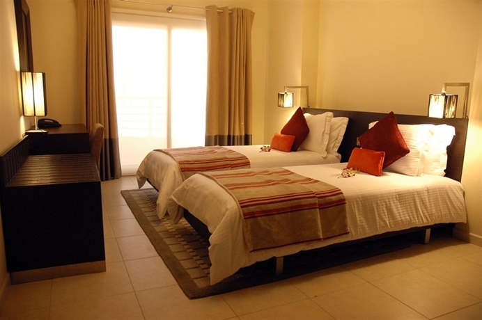 Imagen de la habitación del Hotel Lotus Grand Apartments. Foto 9