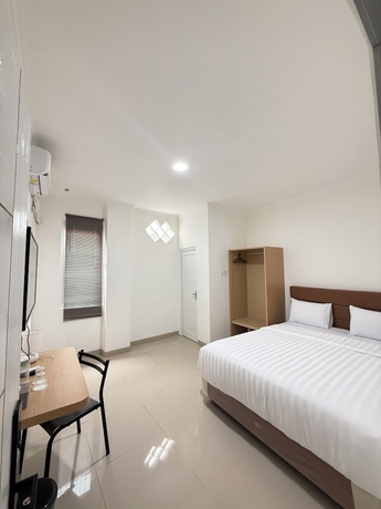 Imagen de la habitación del Hotel Lotus Guest House, Balikpapan. Foto 2