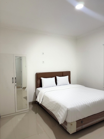 Imagen de la habitación del Hotel Lotus Guest House, Balikpapan. Foto 4