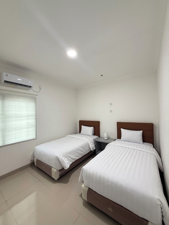 Imagen de la habitación del Hotel Lotus Guest House, Balikpapan. Foto 5