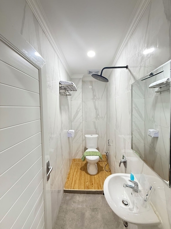 Imagen de la habitación del Hotel Lotus Guest House, Balikpapan. Foto 7