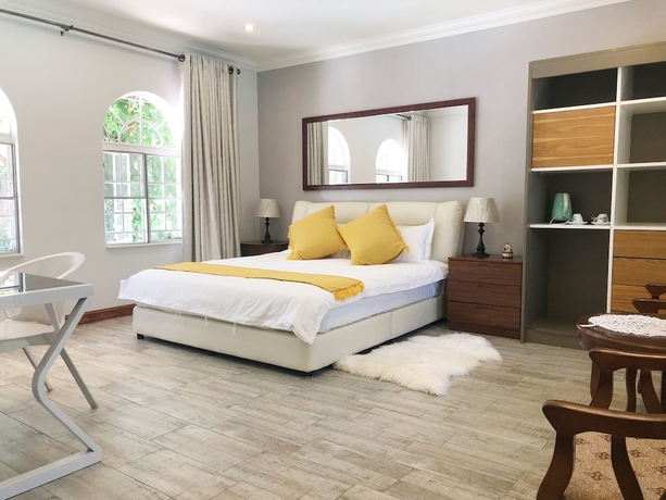 Imagen de la habitación del Hotel Lotus Guest House, Sandton. Foto 1