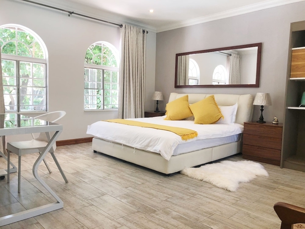 Imagen de la habitación del Hotel Lotus Guest House, Sandton. Foto 2