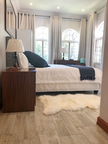 Imagen de la habitación del Hotel Lotus Guest House, Sandton. Foto 6