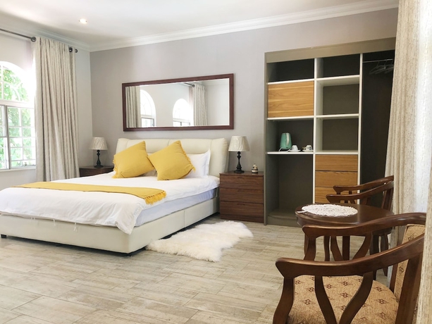 Imagen de la habitación del Hotel Lotus Guest House, Sandton. Foto 11