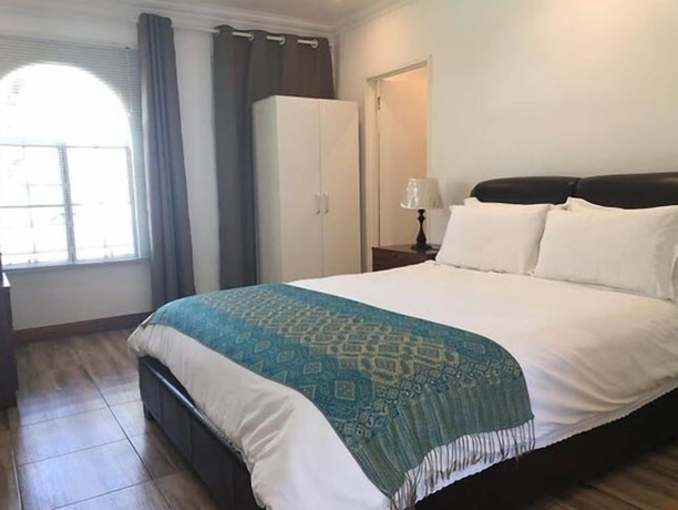 Imagen de la habitación del Hotel Lotus Guest House, Sandton. Foto 12