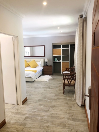 Imagen de la habitación del Hotel Lotus Guest House, Sandton. Foto 14