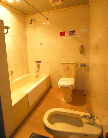 Imagen de la habitación del Hotel Lotus Hotel, Kunming. Foto 6
