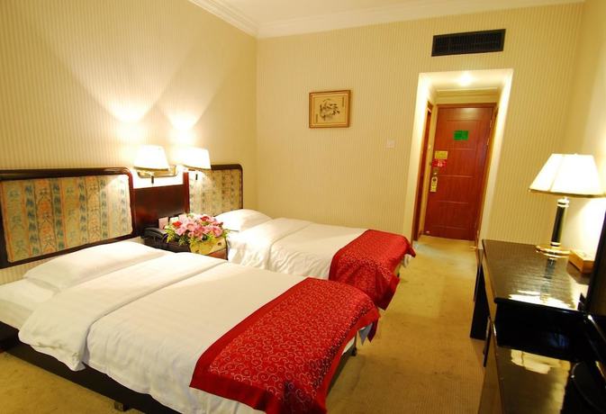 Imagen de la habitación del Hotel Lotus Hotel, Kunming. Foto 7