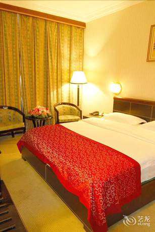 Imagen de la habitación del Hotel Lotus Hotel, Kunming. Foto 8