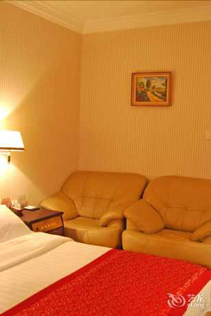 Imagen de la habitación del Hotel Lotus Hotel, Kunming. Foto 9