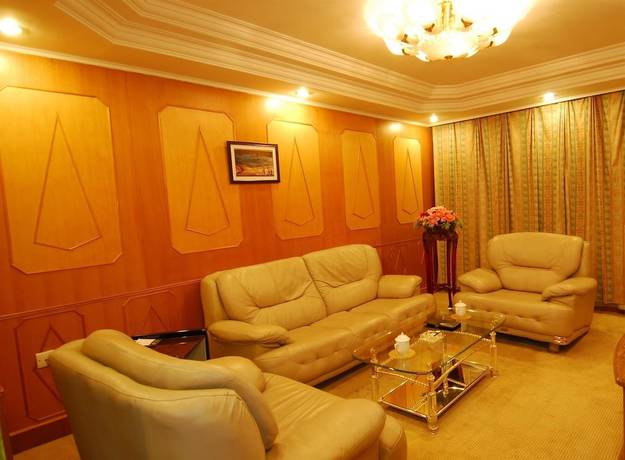 Imagen de la habitación del Hotel Lotus Hotel, Kunming. Foto 13