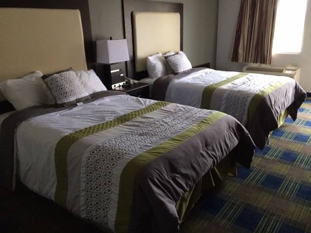 Imagen de la habitación del Hotel Lotus Inn And Suites. Foto 15