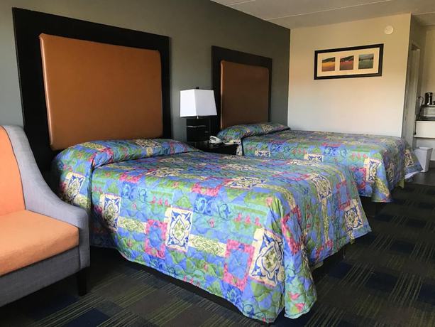 Imagen de la habitación del Hotel Lotus Inn And Suites. Foto 16