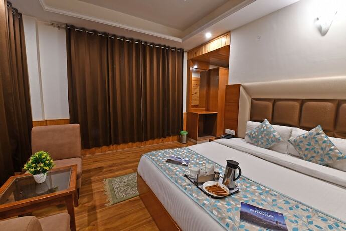 Imagen de la habitación del Hotel Lotus Inn Rothang View. Foto 18