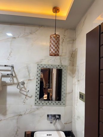 Imagen de la habitación del Hotel Lotus, Kanpur. Foto 14