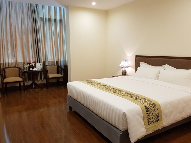 Imagen de la habitación del Hotel Lotus Legend. Foto 6
