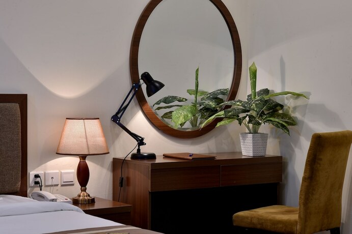 Imagen de la habitación del Hotel Lotus Legend. Foto 10
