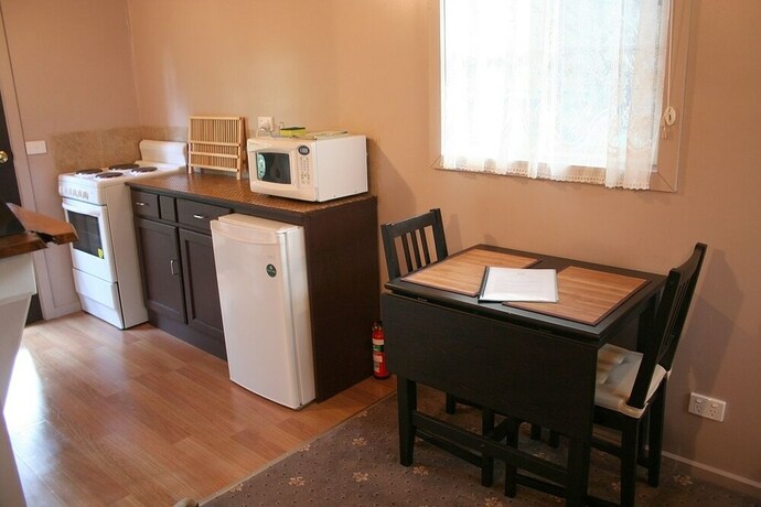 Imagen de la habitación del Hotel Lotus Lodges. Foto 19