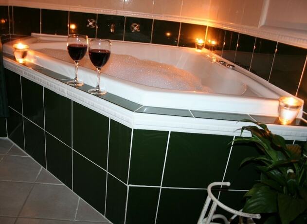 Imagen de la habitación del Hotel Lotus Lodges. Foto 21