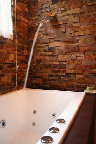 Imagen de la habitación del Hotel Lotus Lodges. Foto 23